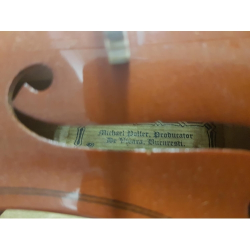 291 - A good quality violin by Michael Poller of Bucharest - case and bow