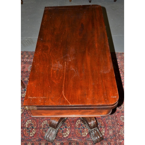 35a - A Victorian Rosewood fold over card table with a highly decorative base