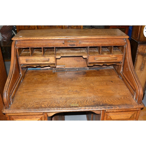 24 - 1930s Oak rolled-top desk