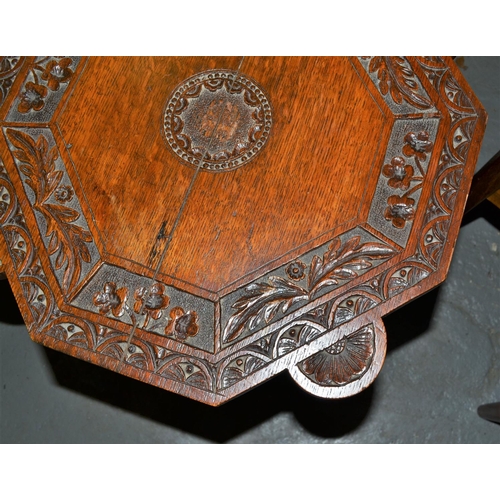 33 - Arts and Crafts period carved oak lamp table