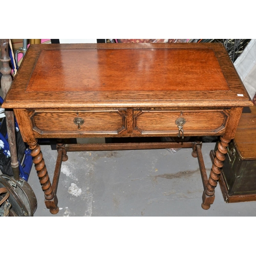 77 - 1930s oak and leather topped desk on barley twist supports