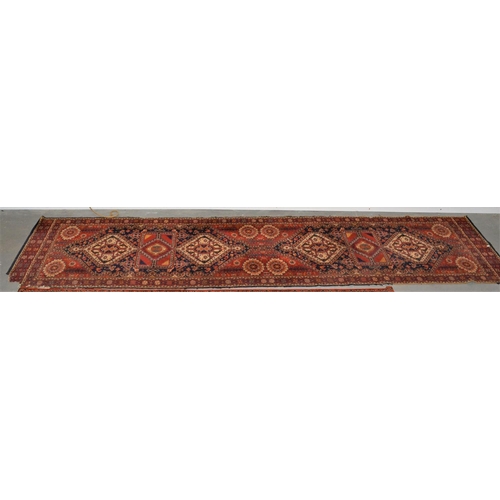 85 - Red and blue hall runner approx 12 ft long