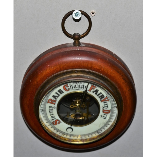 281 - A small round Aneriod wall barometer c.1920