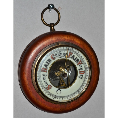 281 - A small round Aneriod wall barometer c.1920