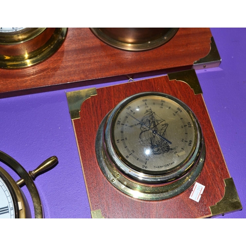 349 - A collection of 5 clocks and barometers - nautical themed