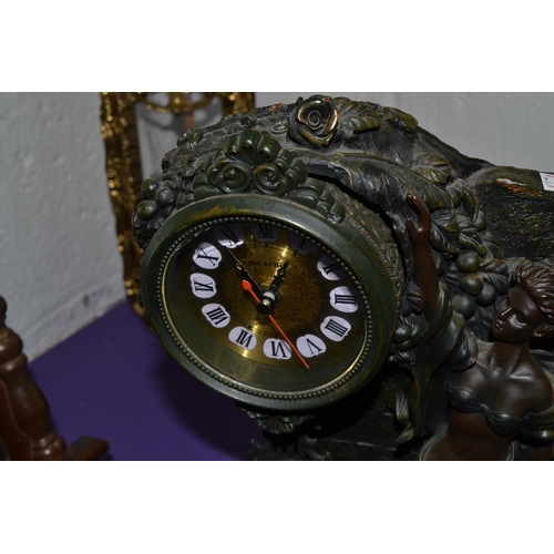 358 - Bronze effect clock mounted with a female figure