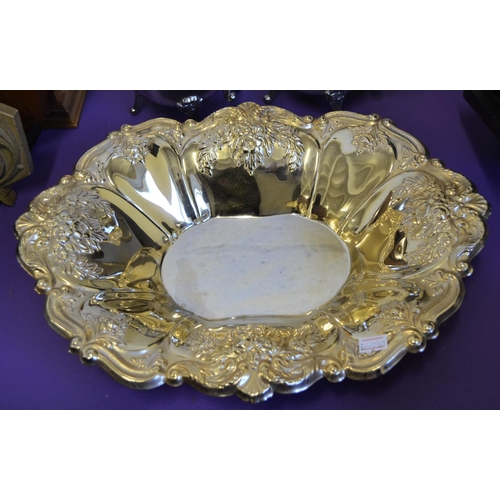 372 - A large silver plate and 24ct gold gilt embossed bowl