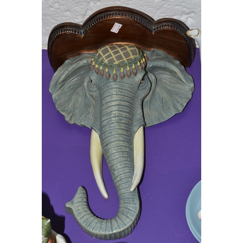 411 - An Elephant wall shelf