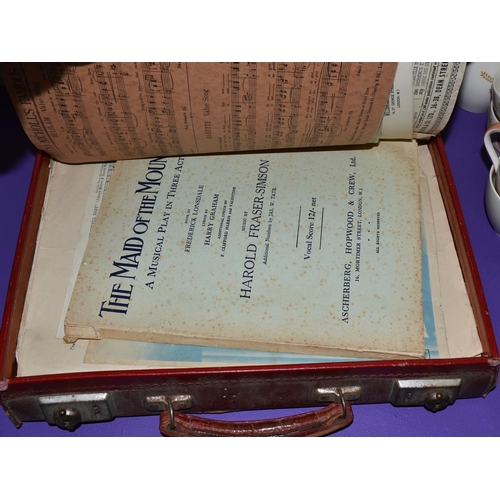 459 - A quantity of vintage sheet music in a leather case