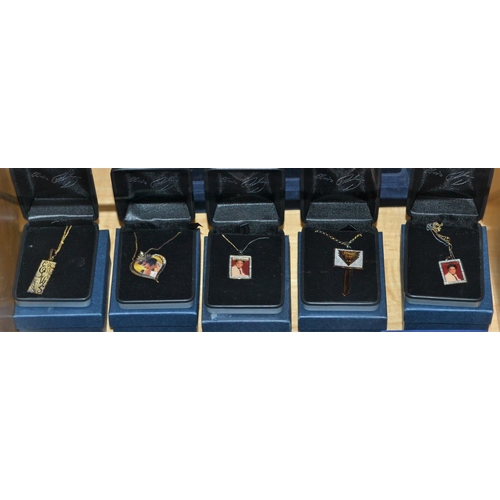 605 - 5 Boxed Elvis Presley necklaces