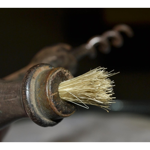 662 - Antique corkscrew with brush