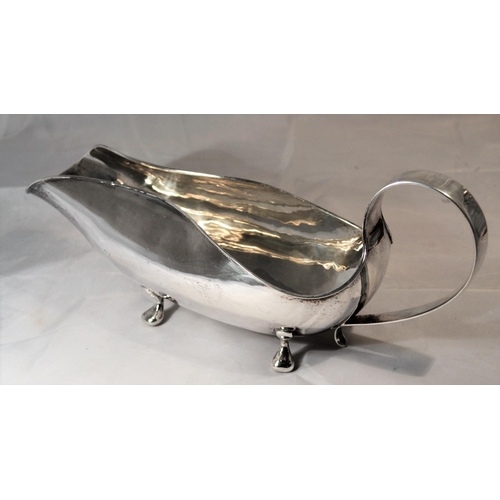 703 - A large silver sauceboat of unusual design - Birmingham 1972 with unknown maker KA - 32cm Long - 20.... 