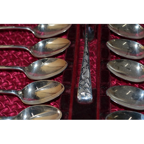 707 - A boxed set of 12 silver tea spoons and tongs - Sheffield 1891 by Joseph Rogers