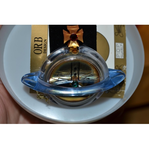 721 - A Vivienne Westwood Orb design Swatch Watch in original box