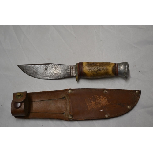 732 - Vintage scout knife in leather scabbard