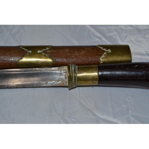 736 - Unusual Ethinc brass and wooden sheathed knife