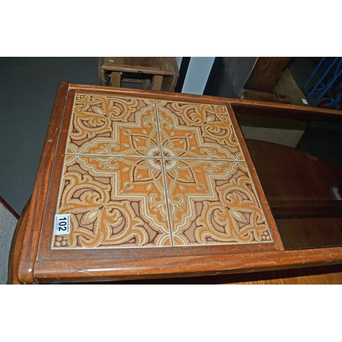 102 - Retro glass and tile topped coffee table