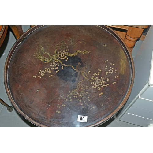 60 - An early 20th century black lacquer tray table and stand