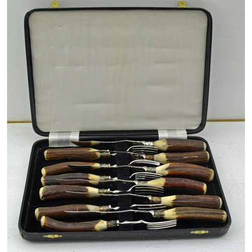 717 - Vintage horn handled steak knife and fork set by Rodgers.