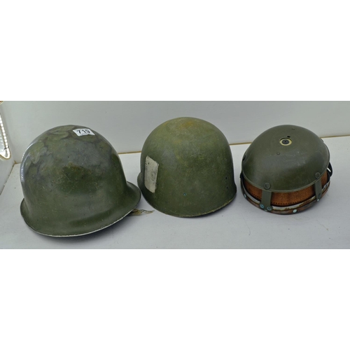 719 - Military Helmet - possibly French and 2 helmet liners