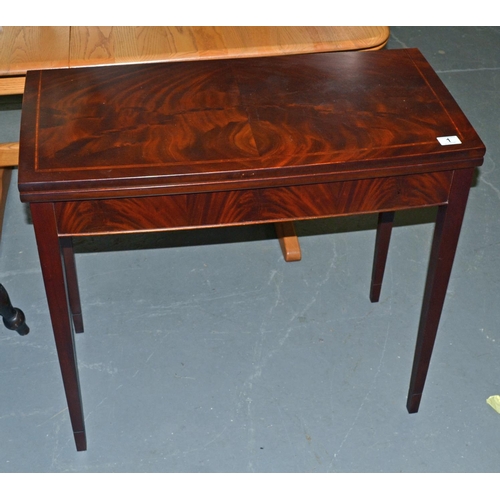 1 - A good quality Mahogany fold over card table with baize interior