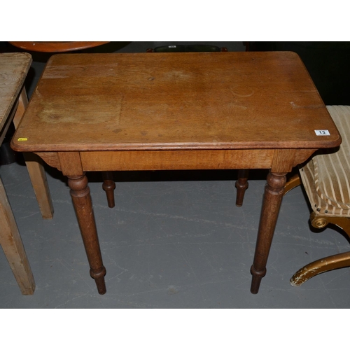 13 - An Arts & Crafts period oak side table with drawer