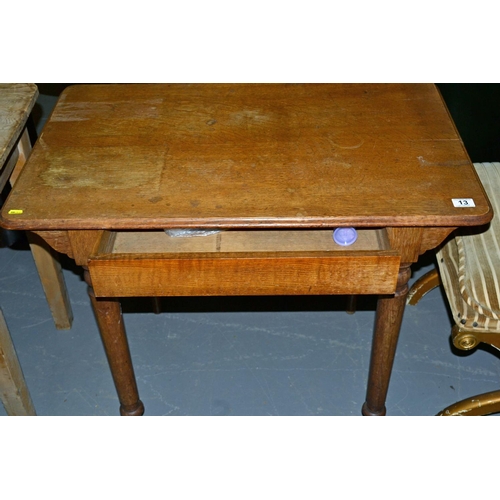 13 - An Arts & Crafts period oak side table with drawer