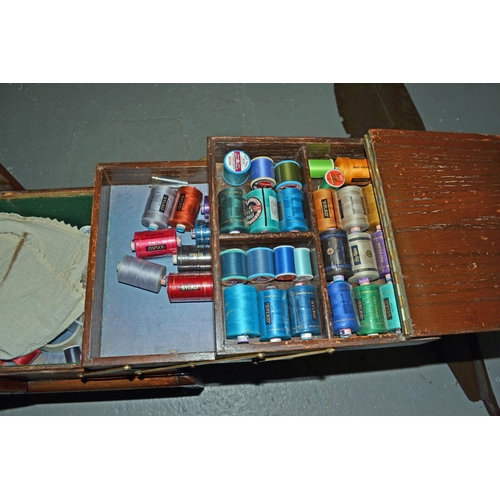 19 - A vintage concertina sewing box and contents