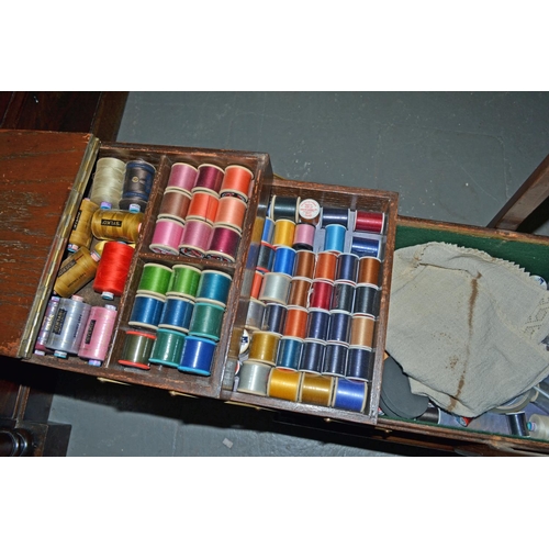 19 - A vintage concertina sewing box and contents