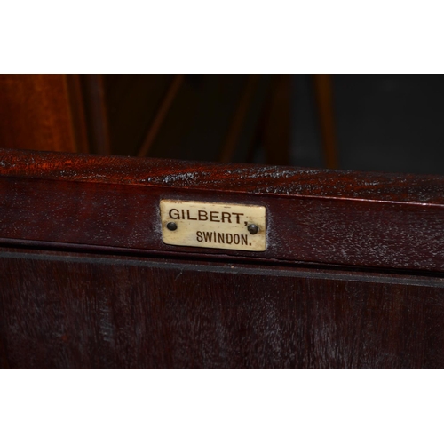 22 - A vintage mahogany bedside cupboard by Gilbert of Swindon