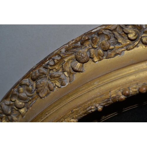 227 - A pair of antique gilt framed oval mirrors