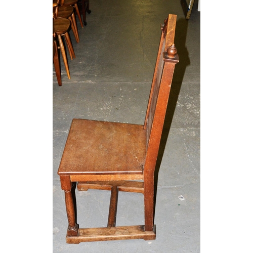 23 - A pair of antique Gothic style oak hall chairs