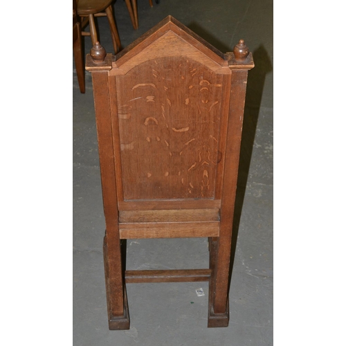 23 - A pair of antique Gothic style oak hall chairs