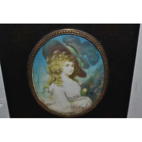 237 - A pair of vintage miniature paintings of ladies on Ivory/ Ivorine in black frames - one signed Rosie