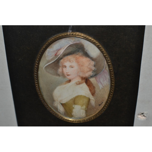 237 - A pair of vintage miniature paintings of ladies on Ivory/ Ivorine in black frames - one signed Rosie