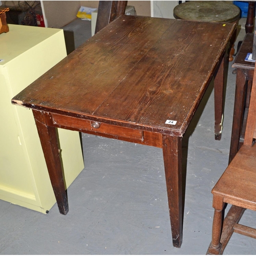 24 - An antique dark stained pitch pine table with drawer