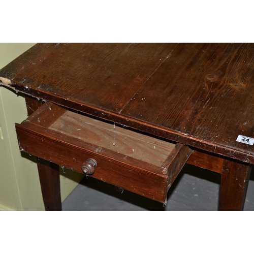 24 - An antique dark stained pitch pine table with drawer