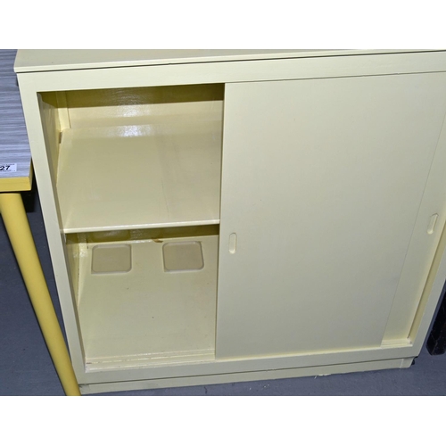 25 - A retro yellow painted 2 door cupboard