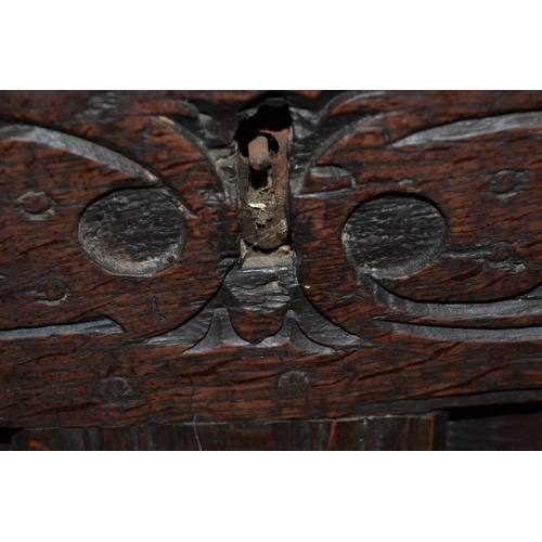 29 - An 18th/19th century small carved Oak coffer