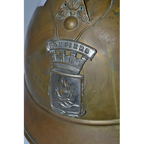 313 - A French brass Adrian fireman's helmet c.1930