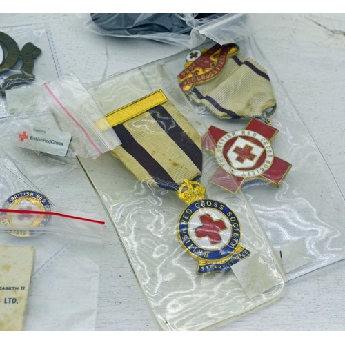 329 - Qty of Red Cross insignia and badges including medals