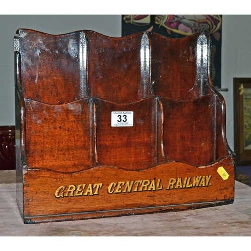 33 - A vintage wooden letter rack with writing on for the 