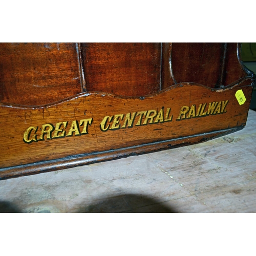 33 - A vintage wooden letter rack with writing on for the 