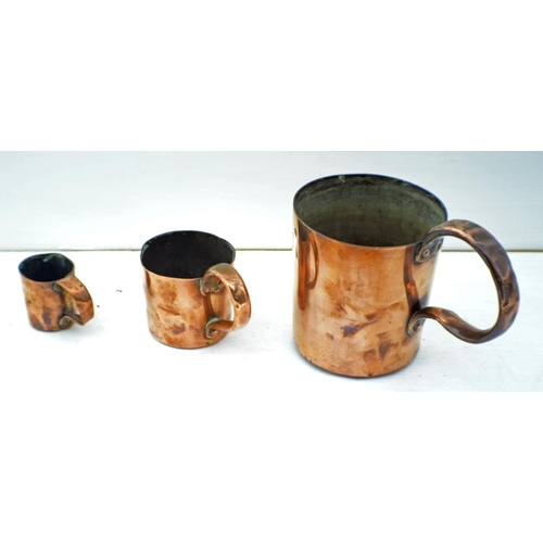 337 - A Graduated set of 3 Victorian Copper Naval Rum measures Quart, Half Pint and one smaller with no ma... 