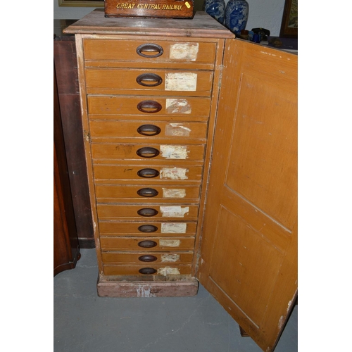 34 - An early 20th century wooden ticket cupboard stamped on the reverse GWR