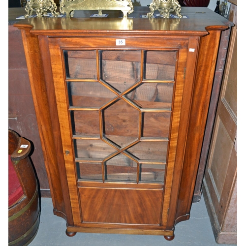 35 - An Edwardian glazed display cabinet with wooden shelves