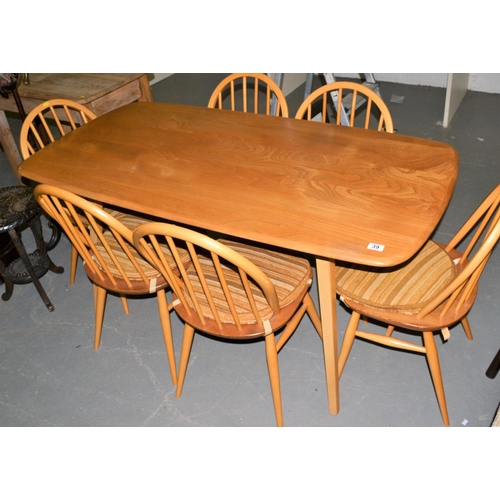 39 - A 1960's Ercol dining table in excellent condition