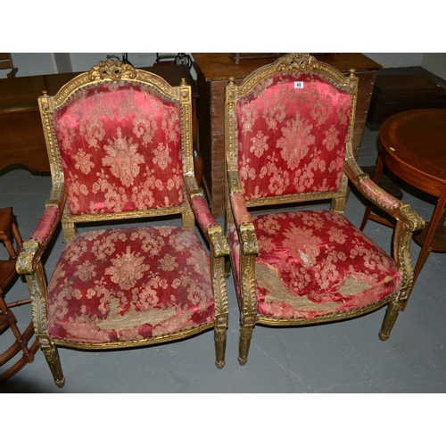 48 - A pair of French Louis XVI style giltwood armchairs