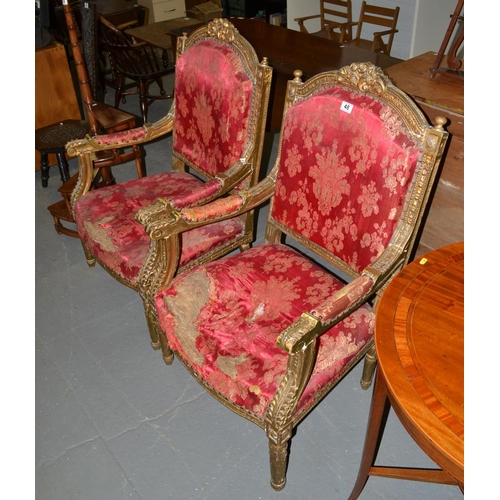 48 - A pair of French Louis XVI style giltwood armchairs