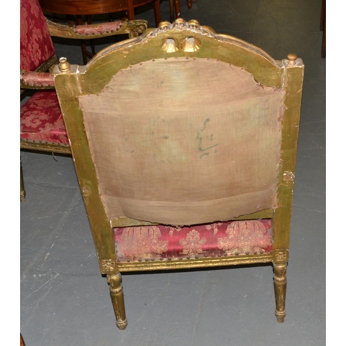 48 - A pair of French Louis XVI style giltwood armchairs